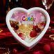 Świeca do masażu w kształcie serca Candy Cranberry Champagne, 70 ml