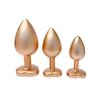 Zestaw trzech zatyczek analnych Dream Toys Gleaming Love, rozmiary S, M, L, perłowe złoto